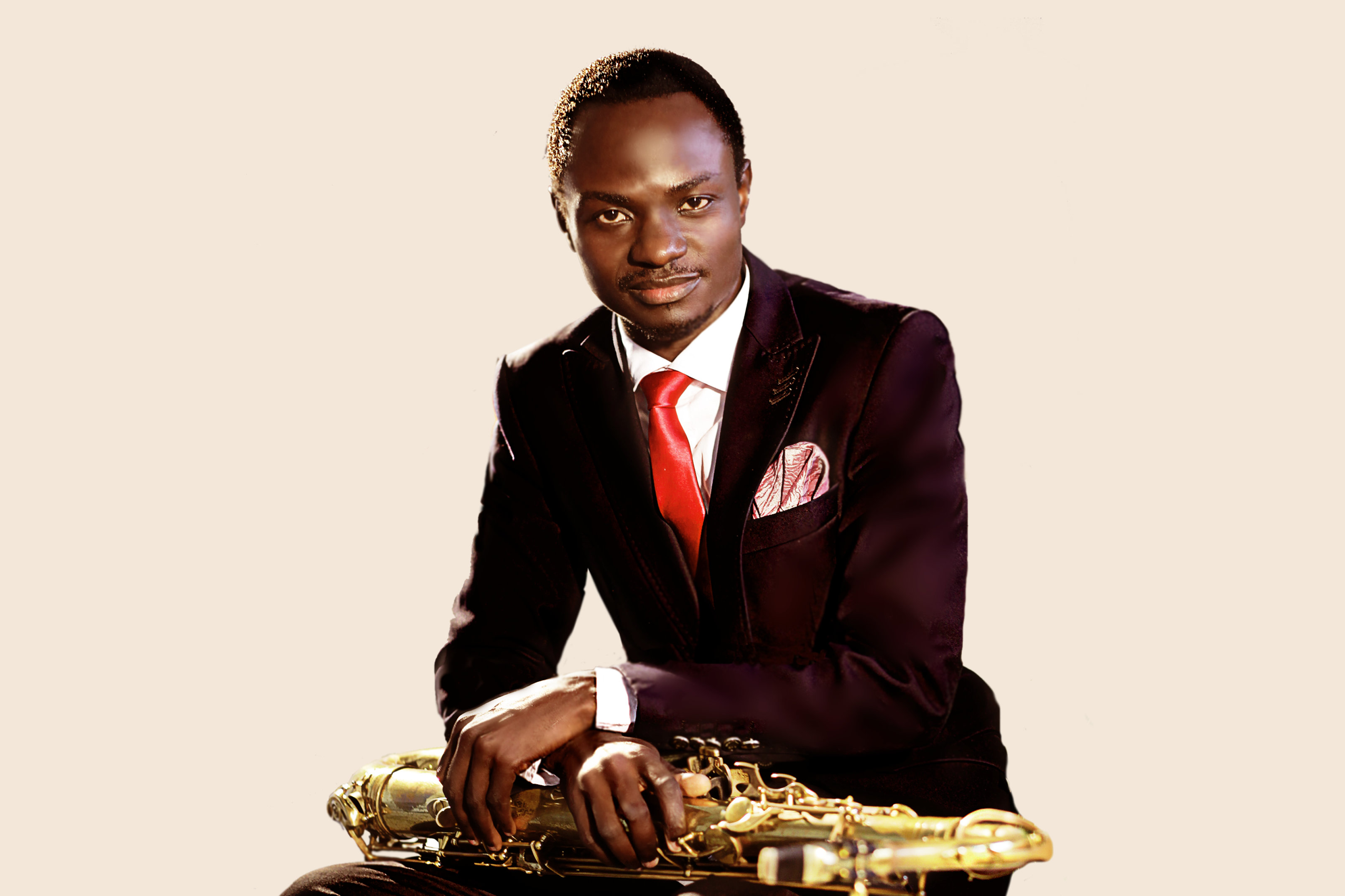 Ayo Solanke playing saxophone